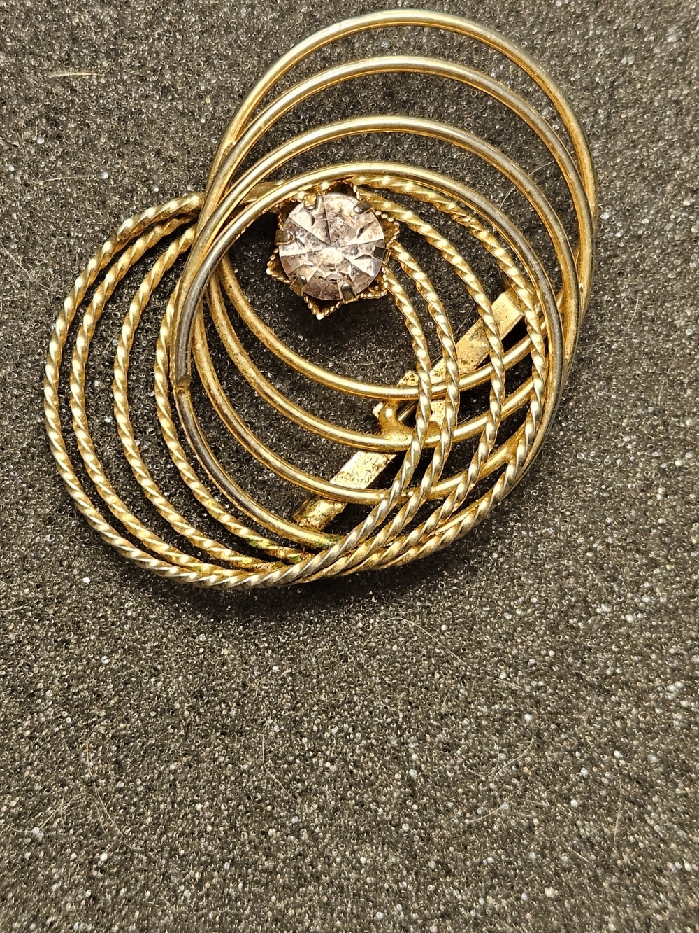 Vintage Gold Tone Multi-Hoop Brooch with Clear Stone.